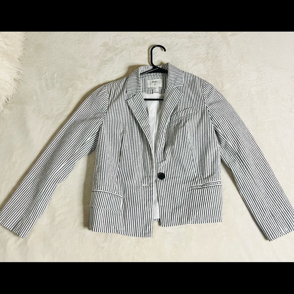 Selling a striped blazer in a small size